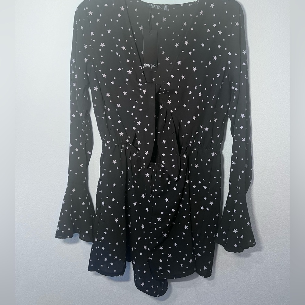Adorable nasty gal star romper with tie opening in front! Us size 6